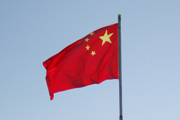 Chinesische Flagge. Gelbe Sterne auf rotem Grund.